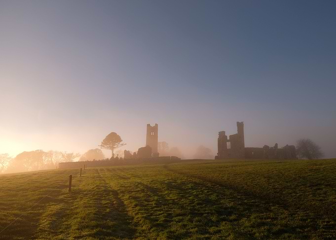 Old ruins in fog