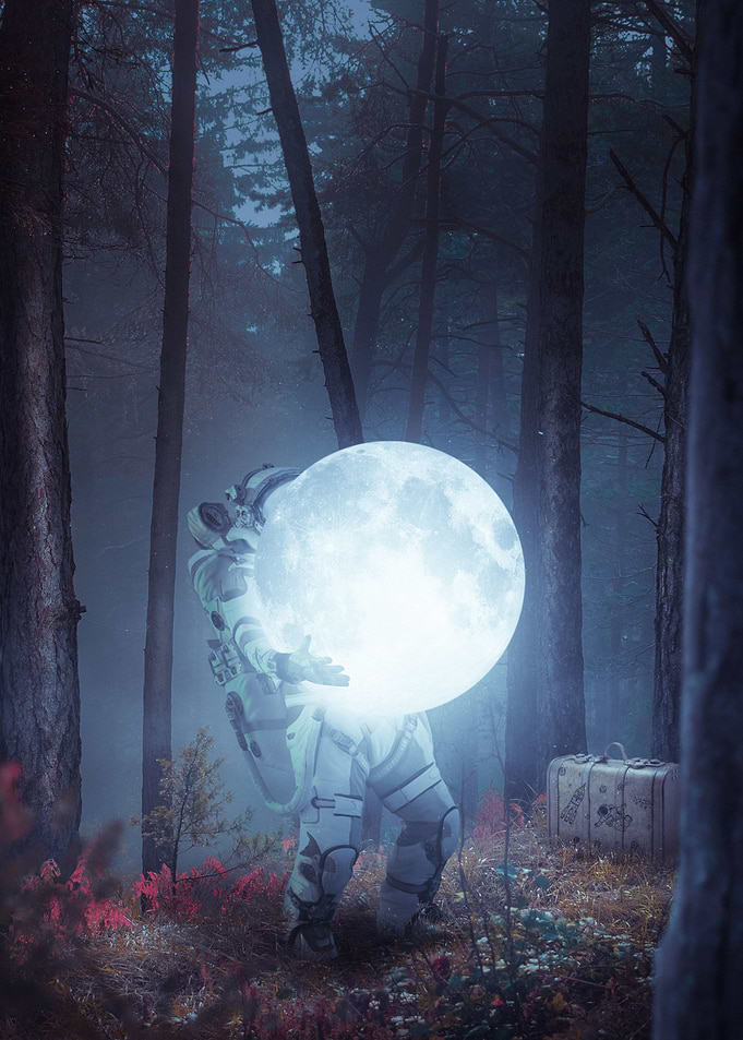 Astronaut holding the moon
