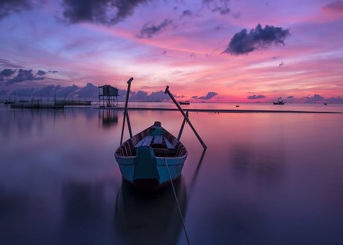Boat at Water by Sunset