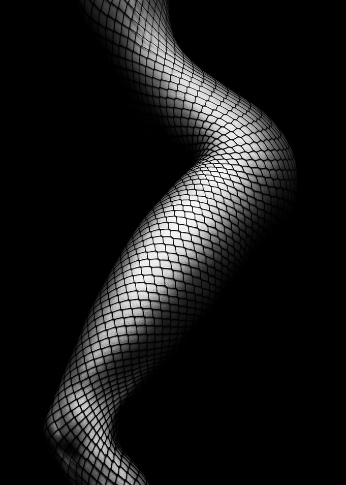 Legs in Fishnet Stockings
