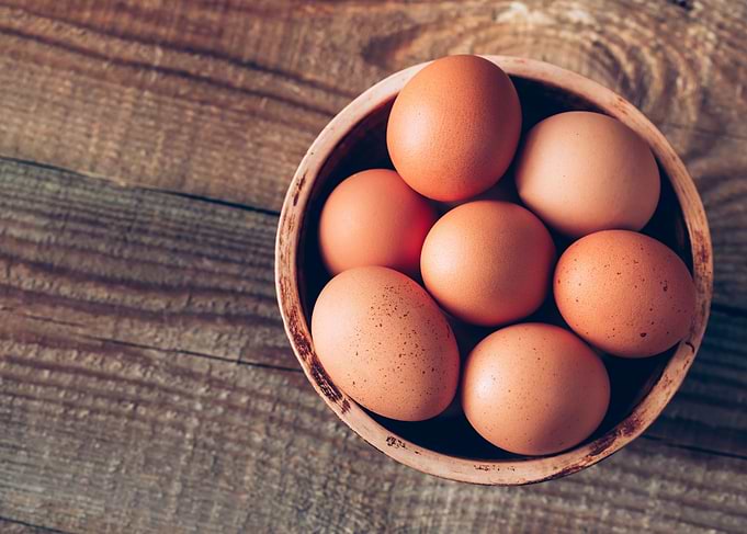 Bowl of raw chicken eggs