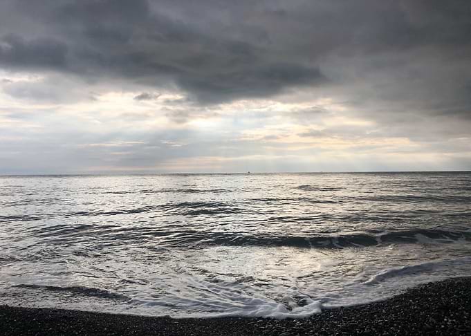 beach center black cloud