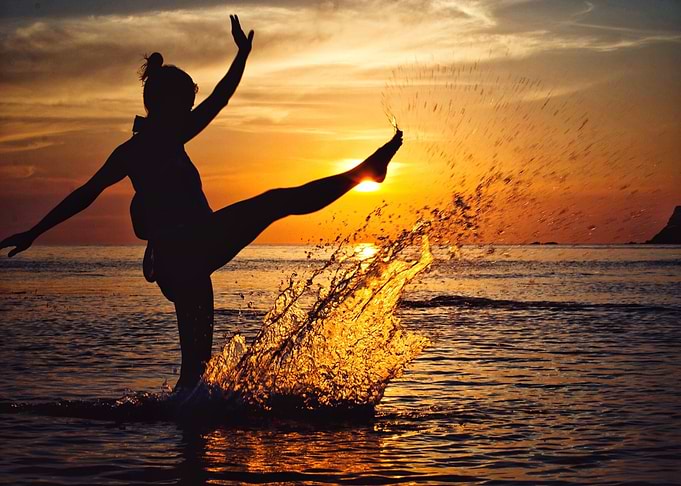 sunset water orange girl