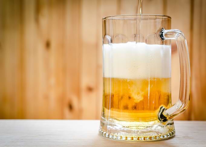 Beer pouring into mug
