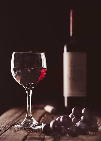 A glass of Red Please
