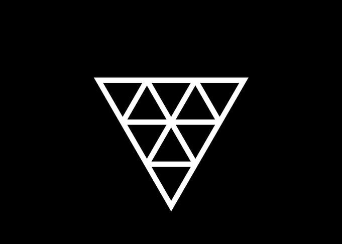White Geometric Glyph Sign