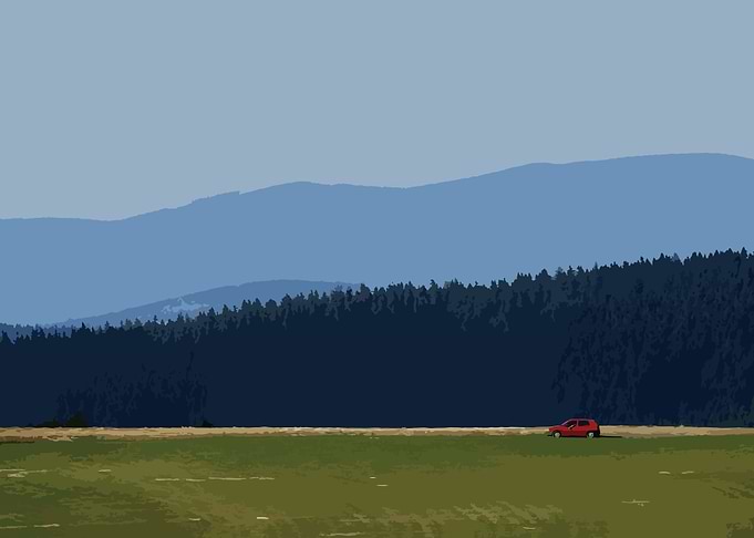 Red car mountain and field