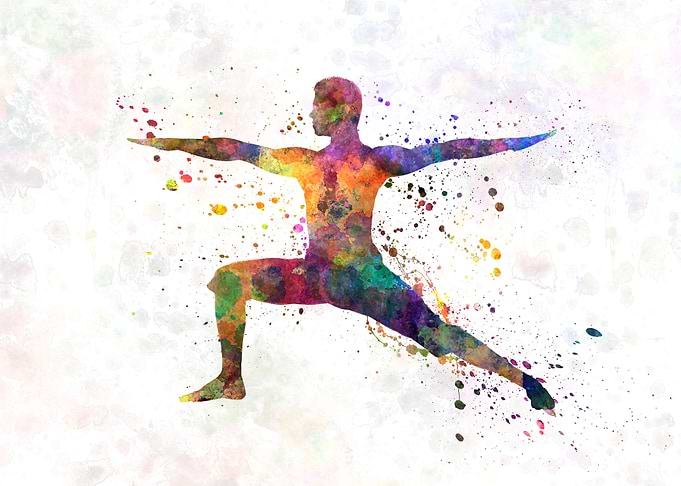 Young man practices yoga