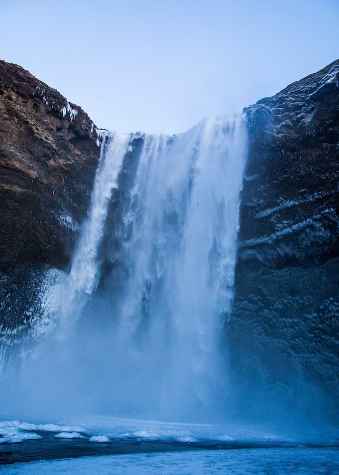 Waterfall by Mountain