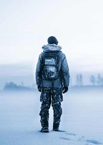 Man walking on snow winter