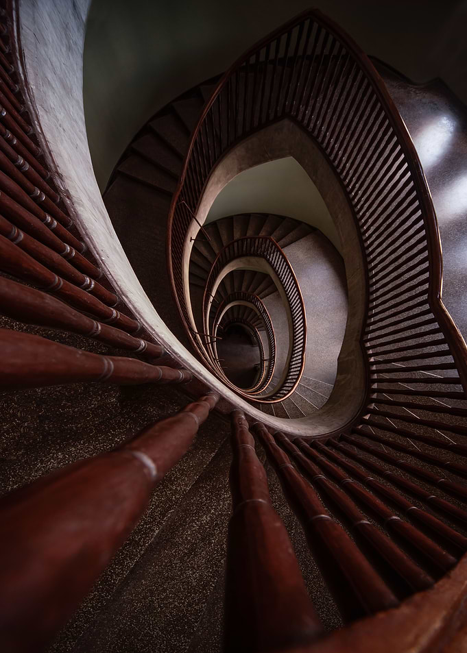 Brown oval staircase