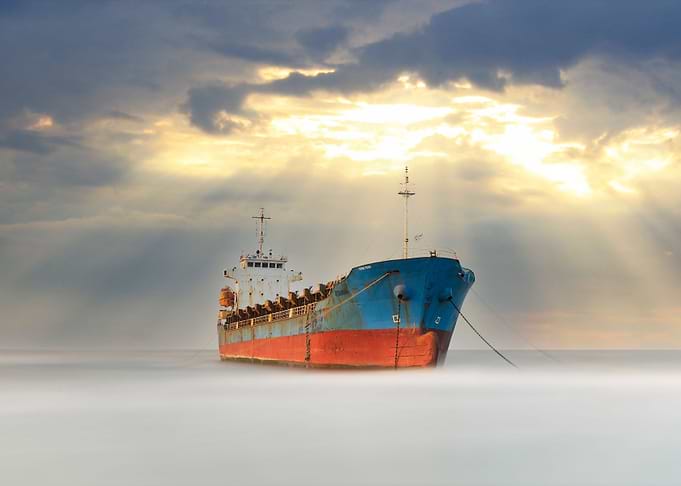 Cargo ship at anchor