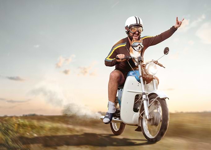 Funny moped driver