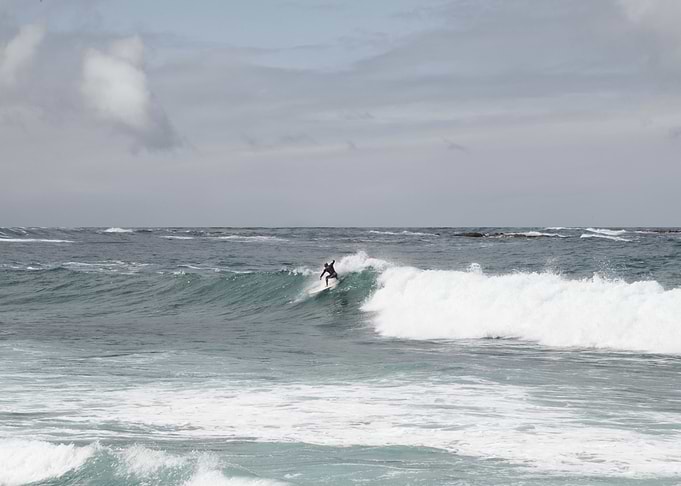 Surfer Riding the Wave 1