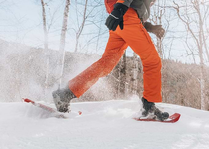 Winter sport snowshoes man
