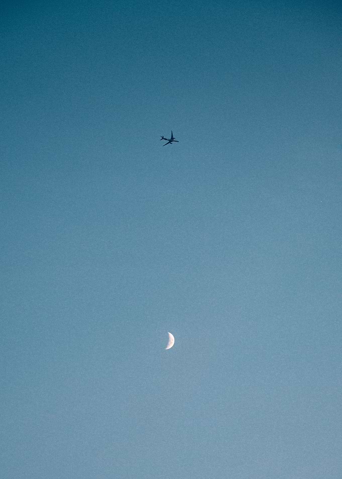 Airplane and moon