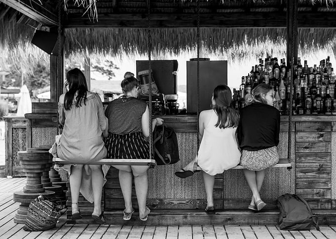 Girls at a bar to drink