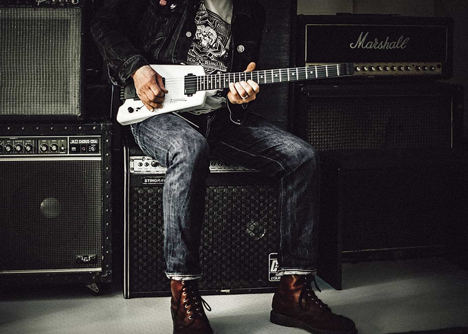 Guitarist strumming