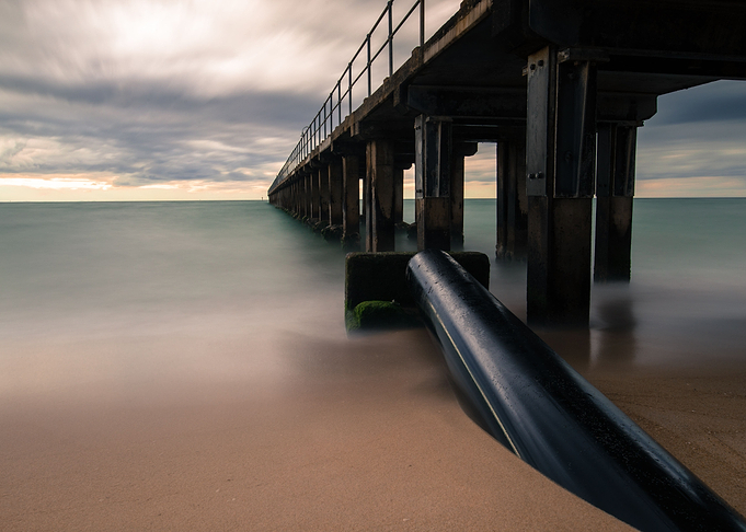 Wooden Pier out at Sea