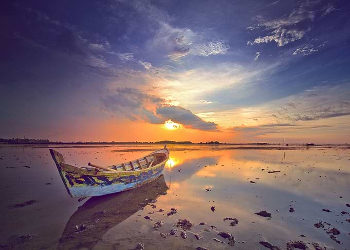 Boat at the Beach Sunset