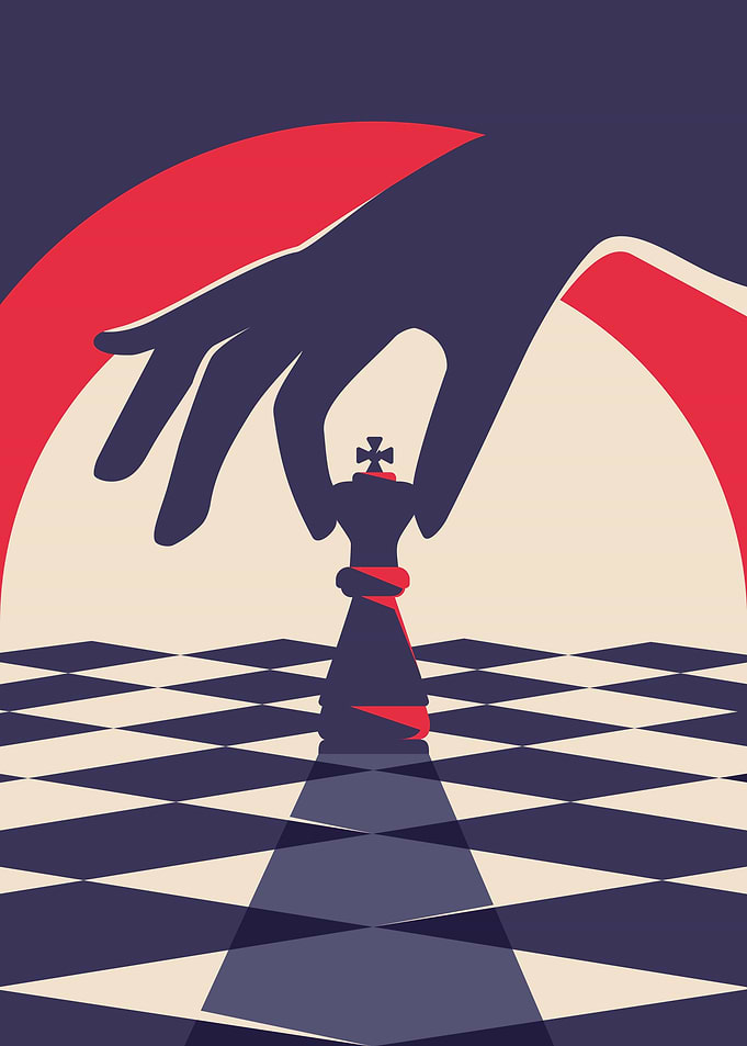 Hand holding chess piece