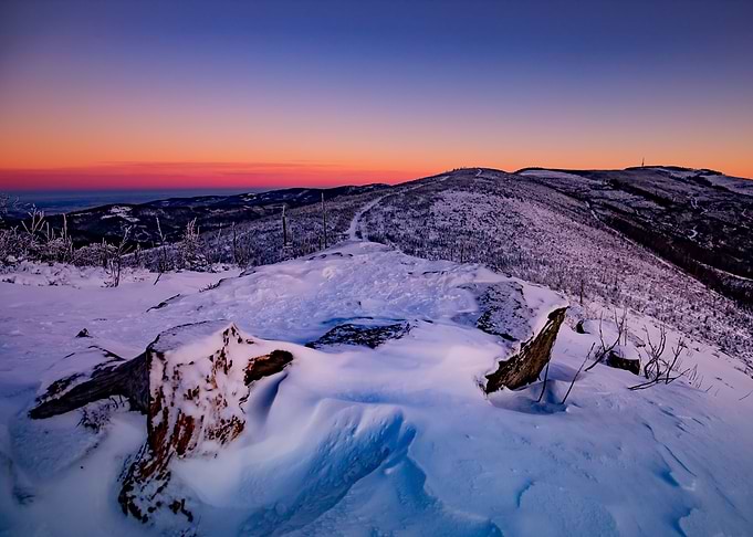 Winter sunrise, snowy hill