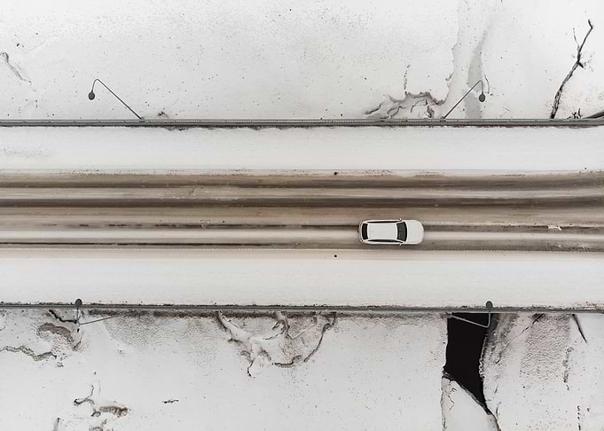 Car Driving On A Bridge