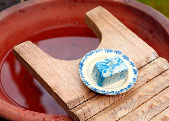 Soap and wooden washboard
