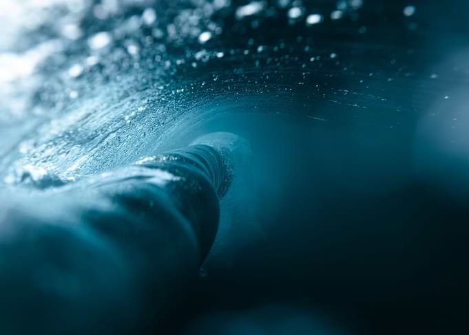 Behind the Wave