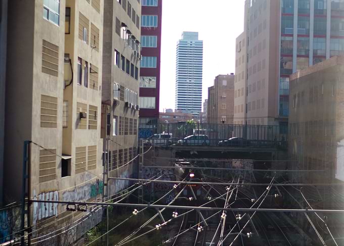 Train Tracks and City