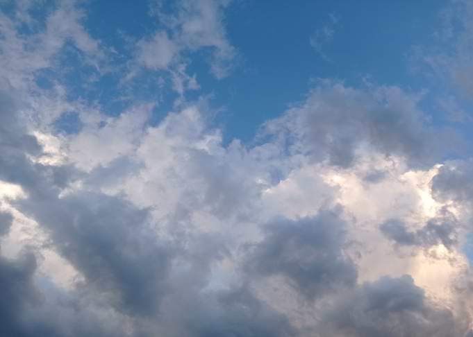 Gray clouds on blue sky