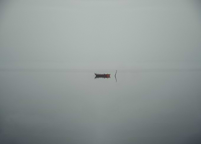 Boat on foggy sea