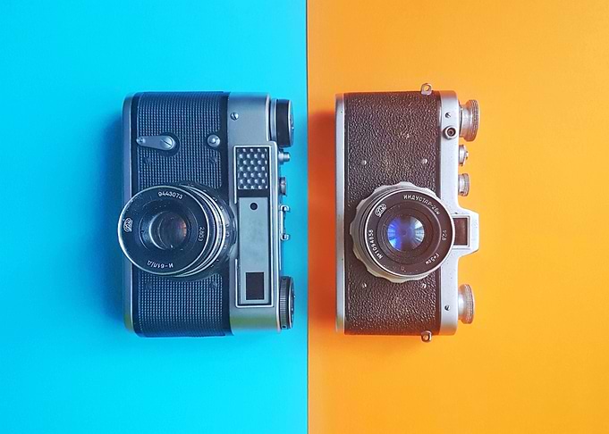 camera cyan and orange ant