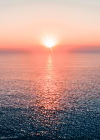 Pink Sunset Over the Ocean