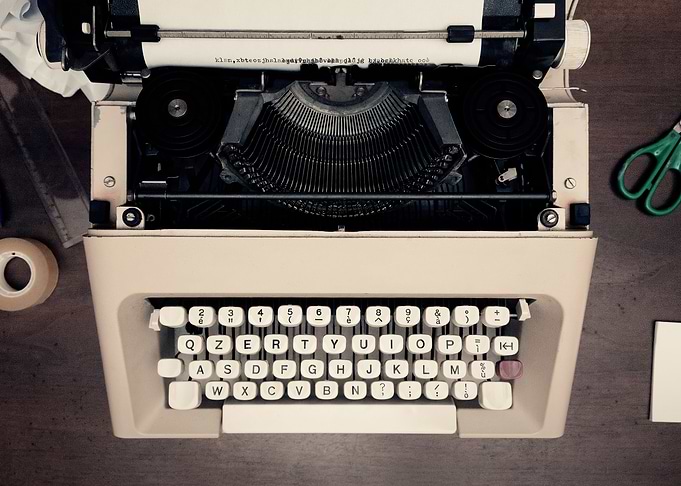 Typewriter scribbled paper