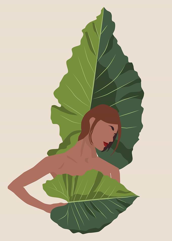 Woman with green leaves