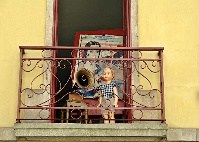 Doll on the balcony