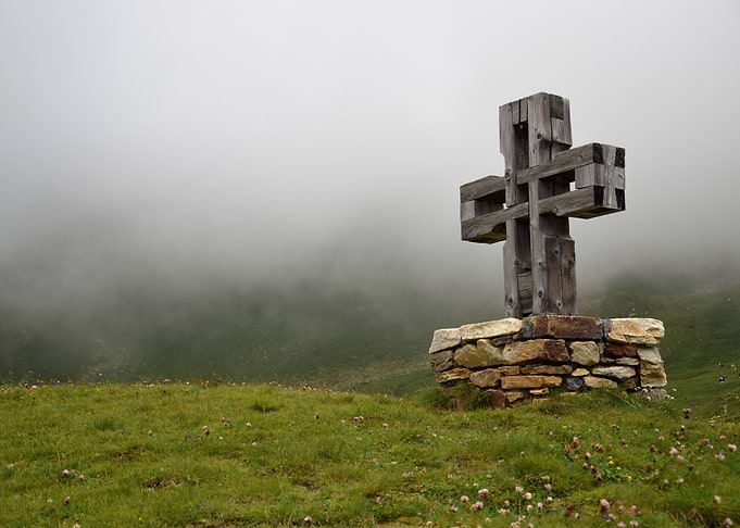 Cross in a field
