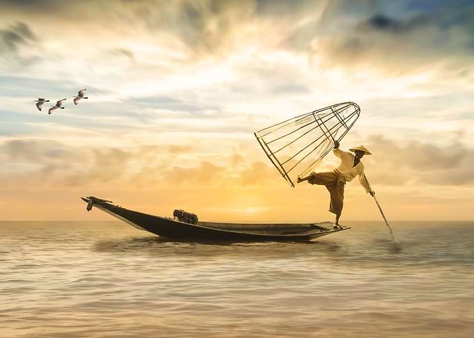 Crazy fisherman and a boat