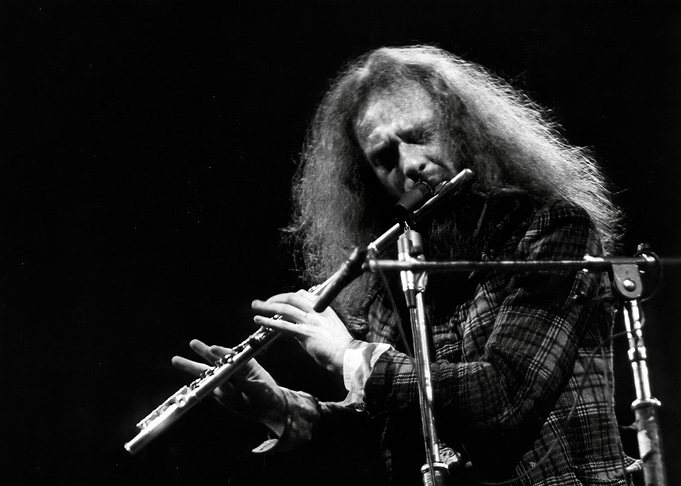 Flutist in black and white