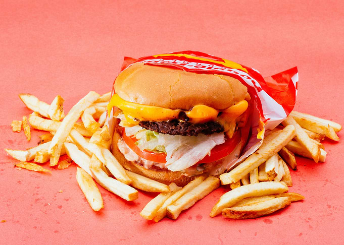 Pink burger with fries