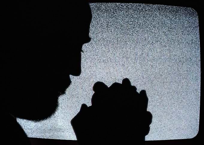 Silhouette man praying dea