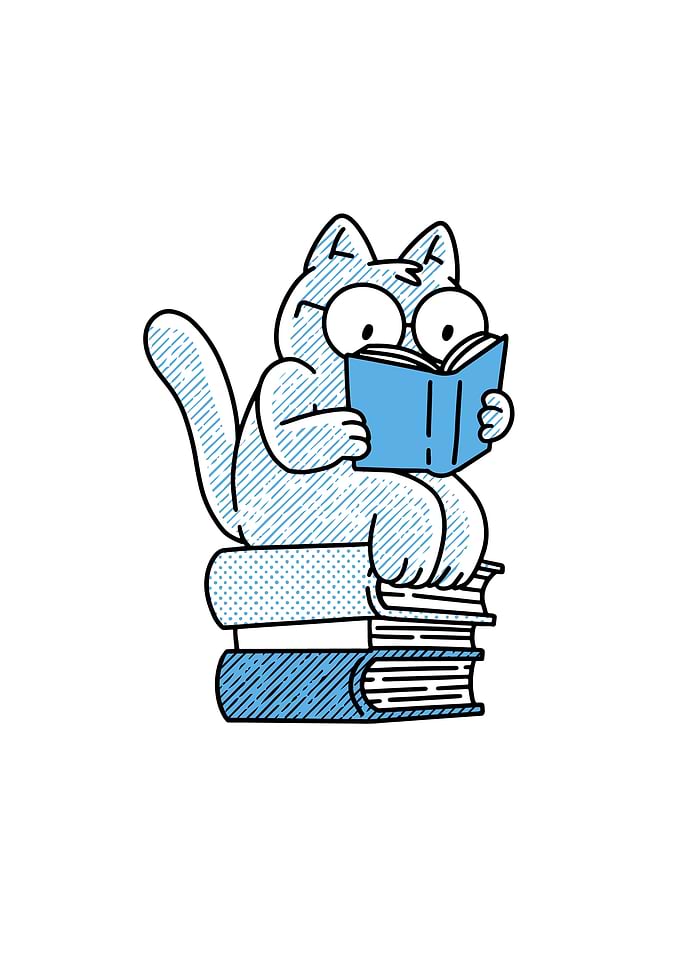 Cat sitting on books and