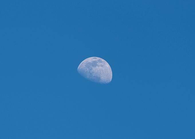 Moon on blue sky