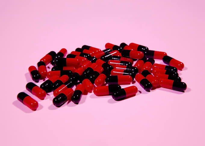 Pills lot pink background