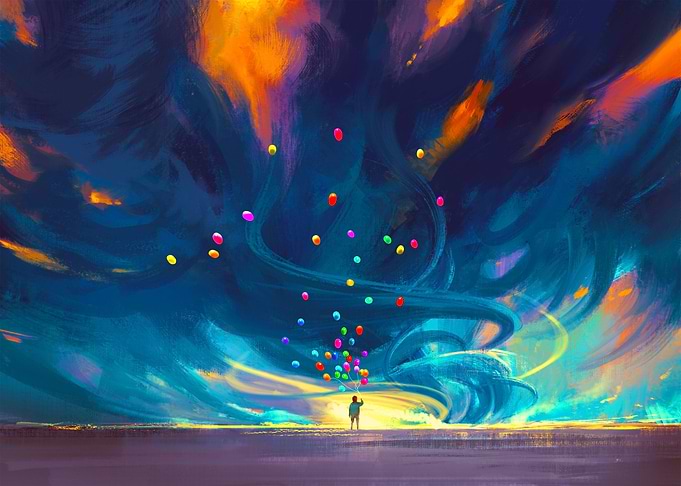 Child holding balloons