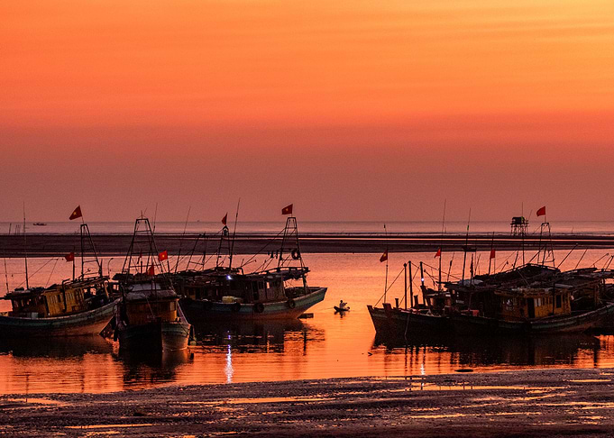 Saling offshore at sunset