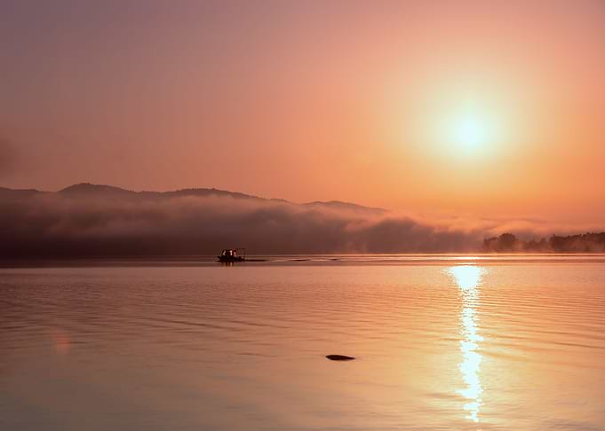 Travel and orange sunrise