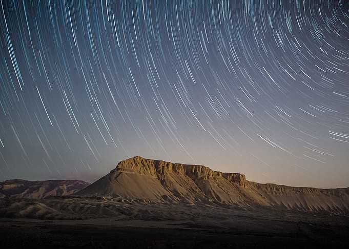 mountains under star