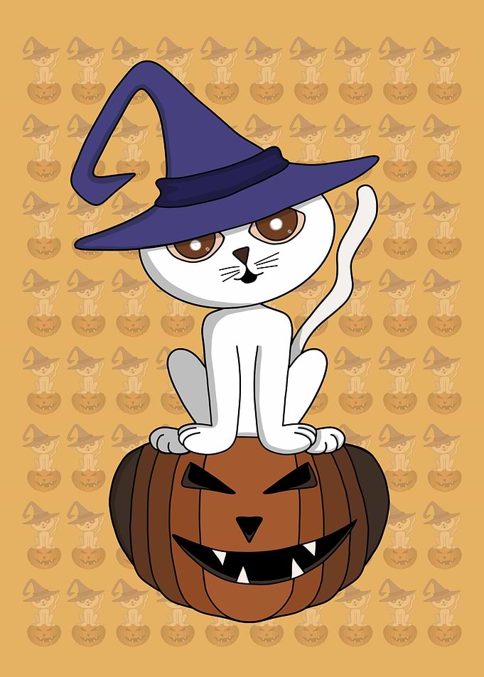 Kitten over a pumpkin